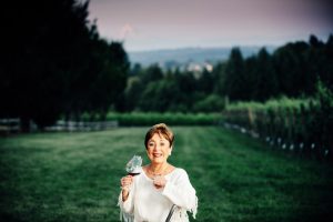 Sheila Blakeslee holding a glass of wine