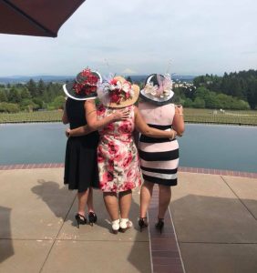 Three woman in hats